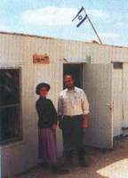 The Dramer family in front of their home